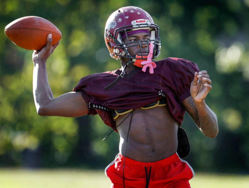 <strong>Kenji Lewis winds up to pass in practice at East High on Tuesday, Oct. 19, 2021.</strong> (Mark Weber/Daily Memphian)
