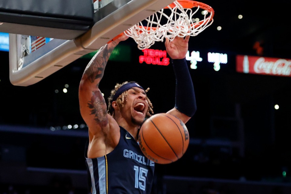 <strong>Memphis Grizzlies forward Brandon Clarke (15) dunks next against the Los Angeles Lakers during the first half of an NBA basketball game in Los Angeles, Sunday, Oct. 24, 2021.</strong> (AP Photo/Ringo H.W. Chiu)