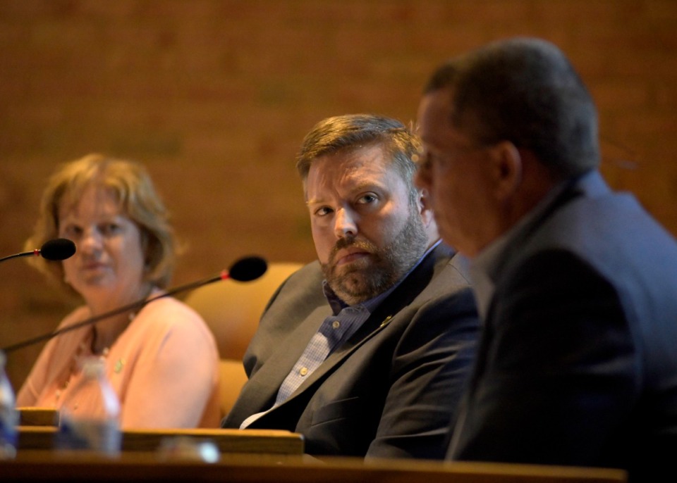 <strong>Brian Ueleke (middle, seen here in July), is one of the aldermen who spoke about the new neighborhood planned near Forest Hill.</strong> (Houston Cofield/Special To The Daily Memphian)