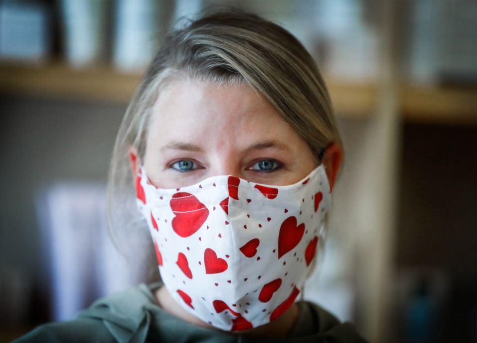 <strong>Merle Norman Cosmetics Owner Kelley Dennis wars a heart covered face mask on Monday, May 4, 2020 at Shelby Farms.</strong> (Mark Weber/Daily Memphian file)