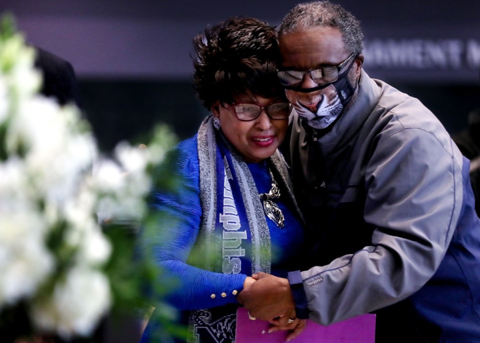 <strong>&ldquo;My husband loved basketball from the day he started playing until the day he died,&rdquo; said Vicki Finch, widow of the late Larry Finch. She received a hug from a friend after speaking at a ceremony honoring her husband at the University of Memphis on Thursday, Oct. 28.</strong> (Patrick Lantrip/Daily Memphian)
