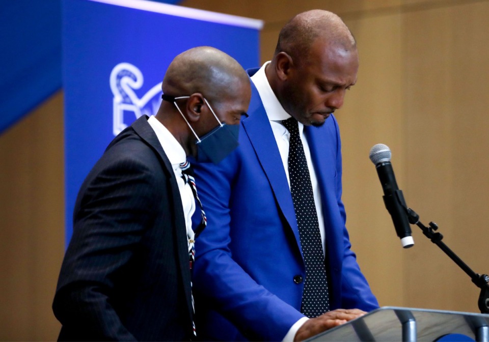 <strong>Former Memphis player Elliot Perry (left) comforts Penny Hardaway at the ceremony honoring their coach, Larry Finch, on Thursday, Oct. 28. Hardaway struggled to speak as he fought back tears.&nbsp;&ldquo;I told myself I was going to cherish this day because he deserved it,&rdquo; Hardaway said. &ldquo;What a wonderful man.&rdquo;</strong> (Patrick Lantrip/Daily Memphian)