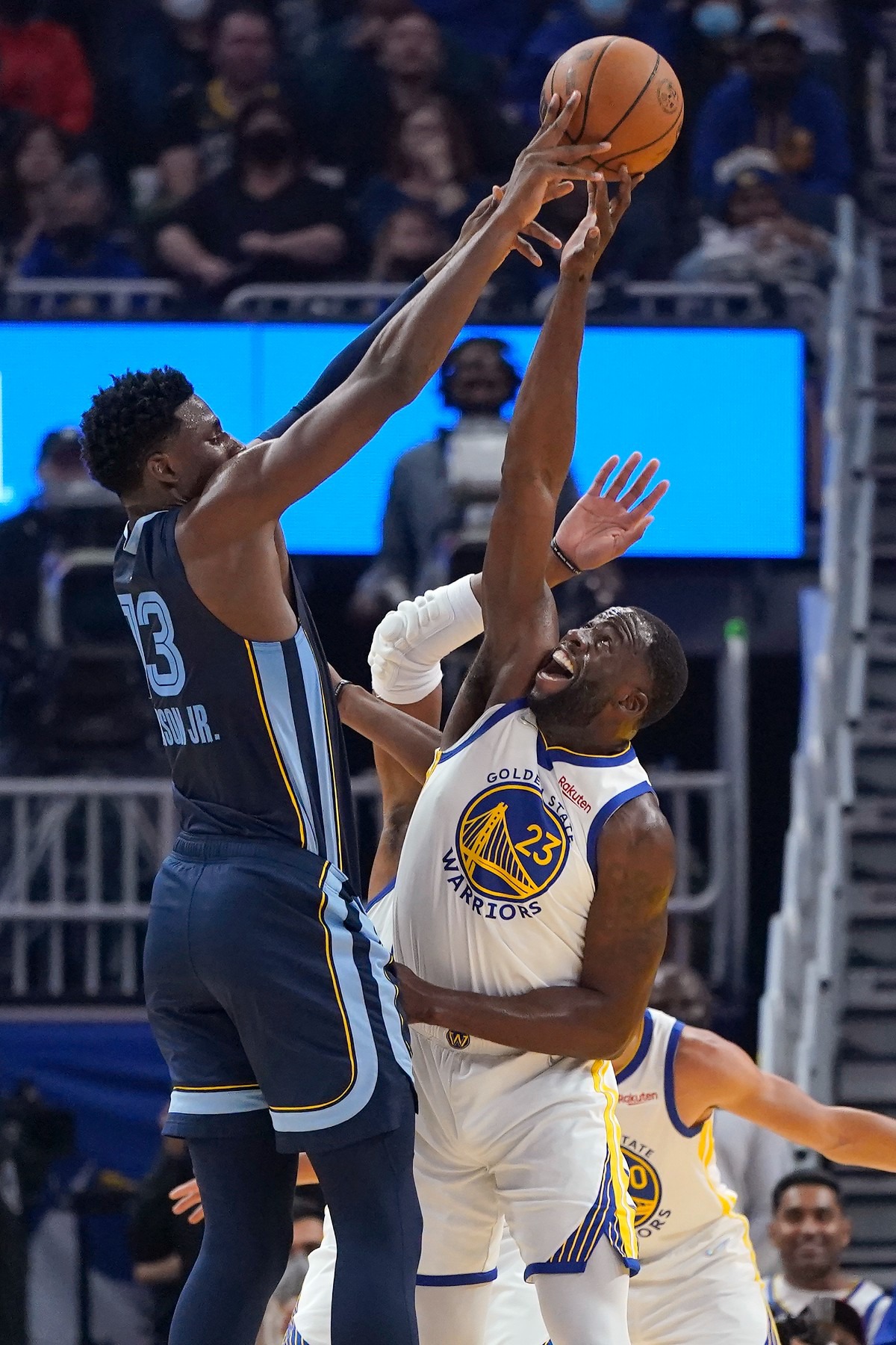 <strong>Grizzlies forward Jaren Jackson Jr., left, shoots over Golden State Warriors forward Draymond Green (23)</strong> <strong>on Oct. 28 in San Francisco.</strong> (Jeff Chiu/AP)