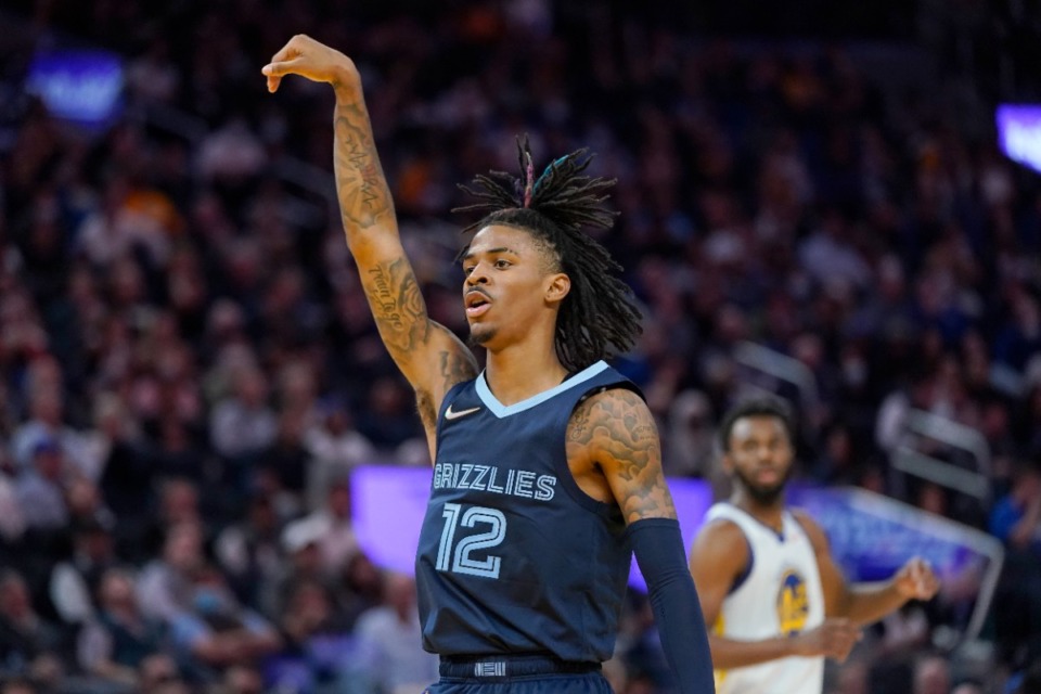 <strong>Grizzlies guard Ja Morant gestures after scoring against the Golden State Warriors</strong>&nbsp;<strong>in San Francisco on Oct. 28.</strong> (Jeff Chiu/AP)