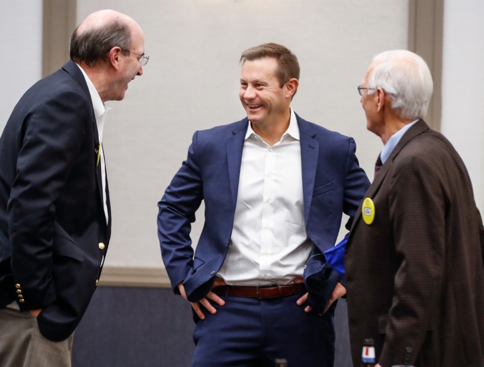 <strong>Touchdown Club of Memphis guest speaker, Memphis head football coach Ryan Silverfield (middle) mingles with club members on Thursday, Oct. 28, 2021.</strong> (Mark Weber/The Daily Memphian)