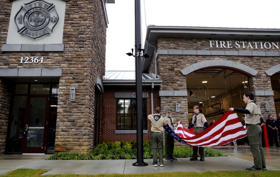 <strong>Boy Scout Troop 452 raises the flag over Arlington Fire Station No. 2 at a grand opening ceremony on Friday, Oct. 29. The new $4.7 million station is the first one built in Arlington in 23 years.&nbsp;</strong> (Patrick Lantrip/Daily Memphian)