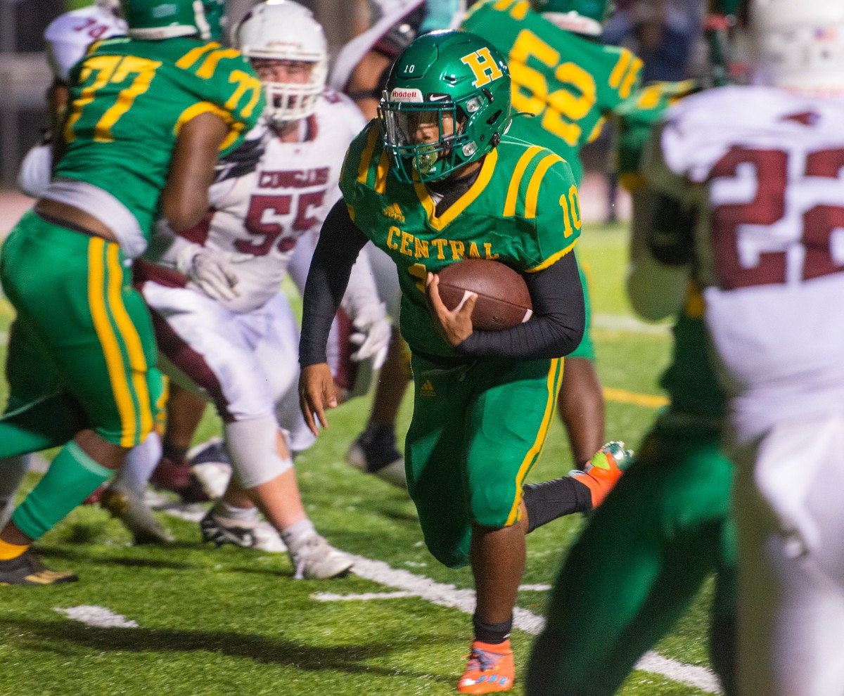 <strong>Central running back Jamarious Brooks breaks up the middle during Friday's Region 8-5A championship contest against Munford at Crump Stadium.</strong> (Greg Campbell/Special to The Daily Memphian)