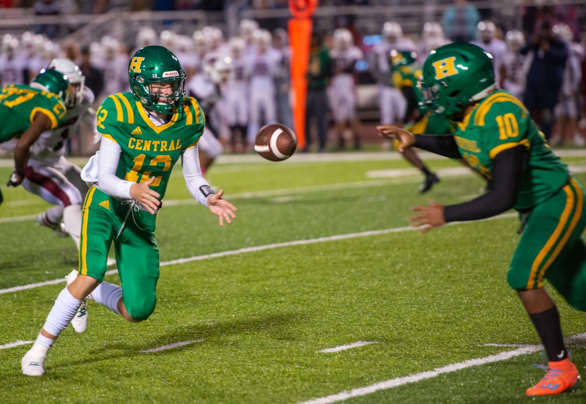 <strong>Central quarterback Law Wright throws a lateral pass to running back Jamarious Brooks at Crump Stadium on Oct. 29.</strong> (Greg Campbell/Special to The Daily Memphian)