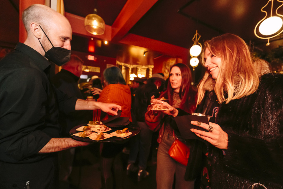 <strong>Server Kenneth Scholes provides food to (left to right,) Lindsey Roberts and Lauren Draffin at Pant&agrave; Tapas Bar &amp; Restaurant on Oct. 29, 2021. </strong>(Ziggy Mack/Special to Daily Memphian)<strong><br /></strong>