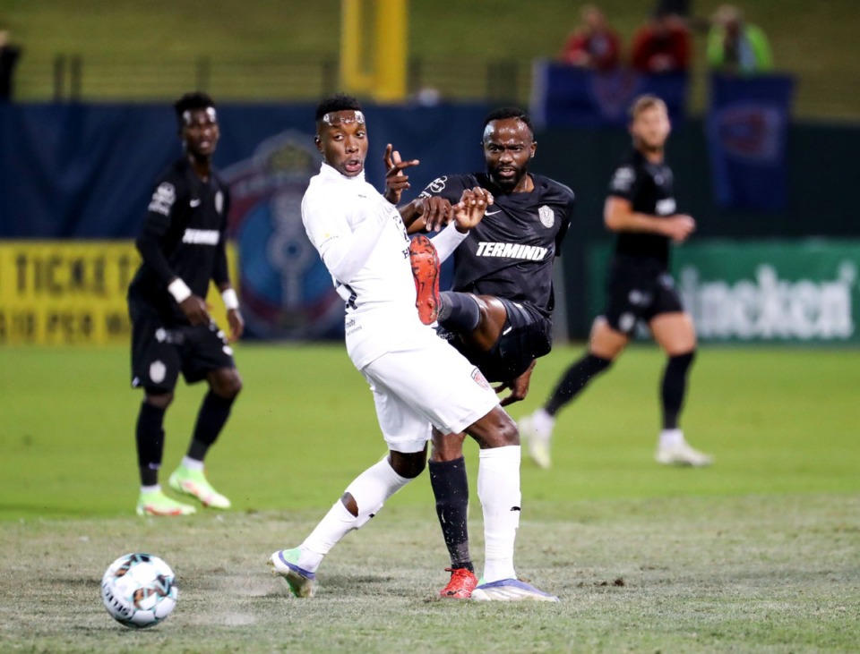 <strong>Memphis 901 FC forward Roland Lamah (20) passes the ball during an Oct. 30, 2021 match against Indy Eleven.</strong> (Patrick Lantrip/Daily Memphian)