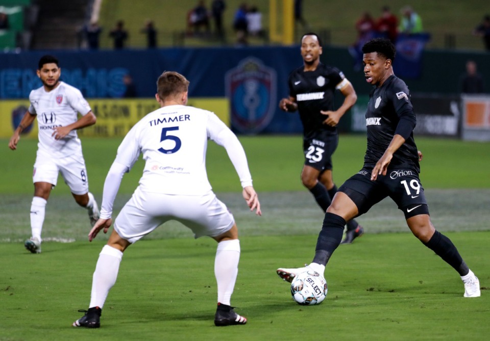 <strong>Memphis 901 FC midfielder Dre Fortune (19) brings the ball up the pitch during an Oct. 30, 2021 match against Indy Eleven.</strong> (Patrick Lantrip/Daily Memphian)