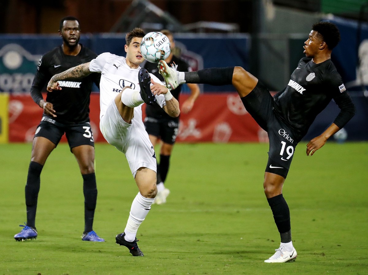 <strong>Memphis 901 FC midfielder Dre Fortune (19) goes for a loose ball during an Oct. 30, 2021 match against Indy Eleven.</strong> (Patrick Lantrip/Daily Memphian)