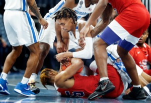 <strong>Memphis Tigers guard Emoni Bates (middle) battles Lane College freshman Justin Sylver (35) for a loose ball during action on Sunday, Oct. 31, 2021 at FedExForum.</strong> (Mark Weber/The Daily Memphian)