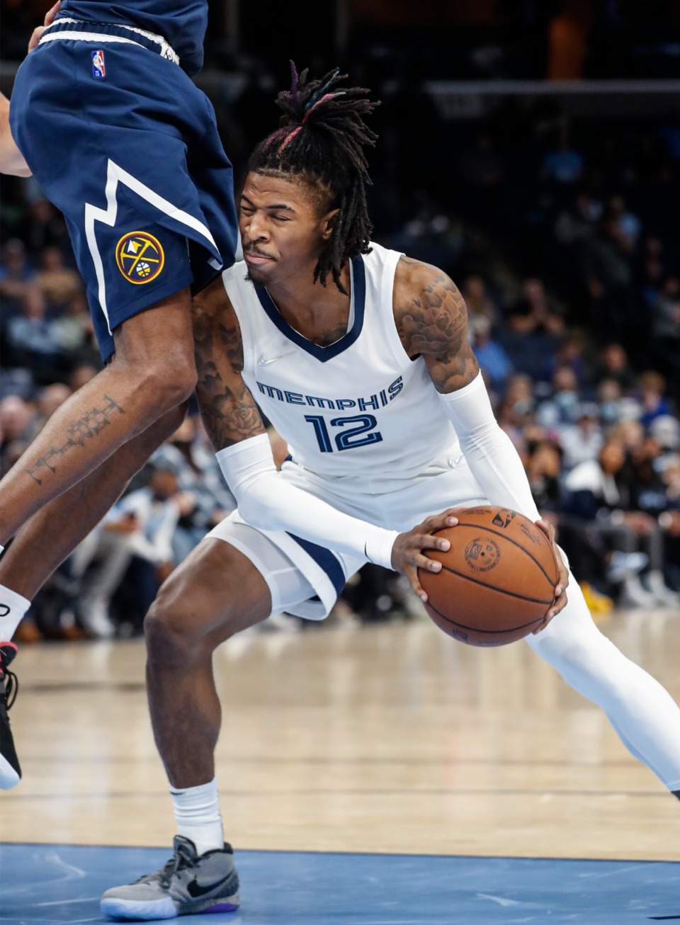 <strong>Ja Morant is fouled while driving the lane against the Denver Nuggets on Monday, Nov. 1.</strong> (Mark Weber/Daily Memphian)