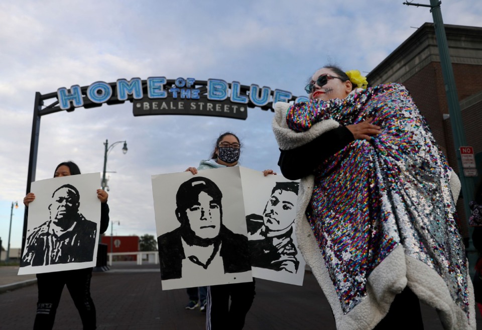 <strong>Karina Salcedo marches down Beale Street on Tuesday, Nov. 2, in a march to honor those who have been killed by gun violence in Memphis.</strong> (Patrick Lantrip/Daily Memphian)