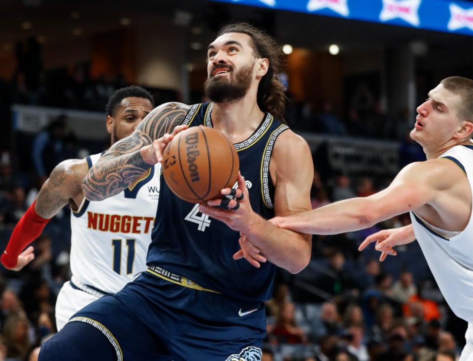 <strong>Memphis Grizzlies center Steven Adams is fouled by Denver Nuggets defender Nikola Jokic (right) during action on Wednesday, Nov. 3.</strong> (Mark Weber/Daily Memphian)