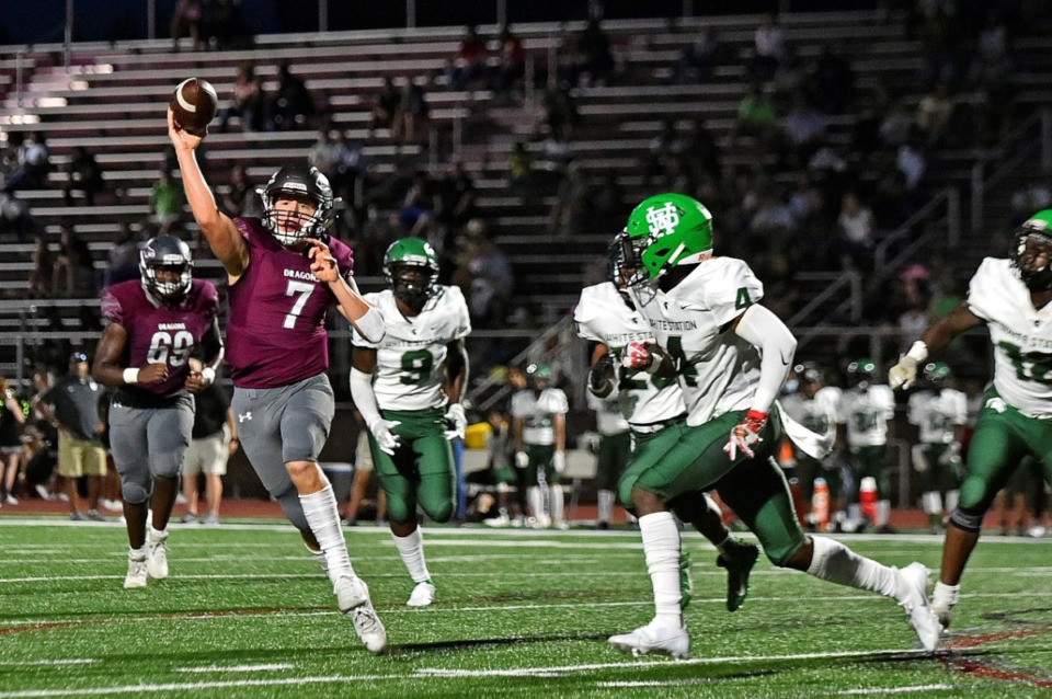 <strong>Collierville quarterback Houston Wilhelm (7) throws a pass under pressure from White Station on Sept. 3. He is Week 11&rsquo;s Player of the Week.</strong> (Justin Ford/Daily Memphian file)