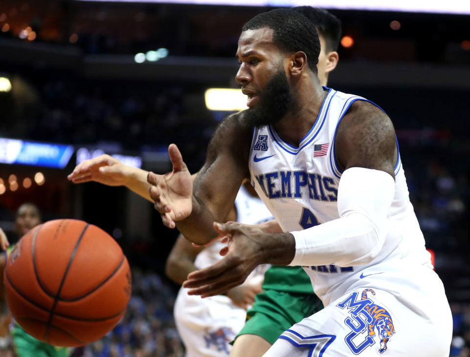 <strong>Memphis Tigers forward Raynere Thornton (4) loses the ball on a drive to the basket during a game against the Tulane Green Wave on Wednesday, Feb. 20, 2019.</strong> (Houston Cofield/Daily Memphian)