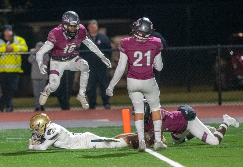<strong>Independence High&rsquo;s Hunter Howard (5) scores after a reception near the end zone despite Collierville's Jaden Lee (18), Harrison Craig (21) and Gyasi Wallace (33) on Nov. 5.</strong> (Greg Campbell/Special to The Daily Memphian)