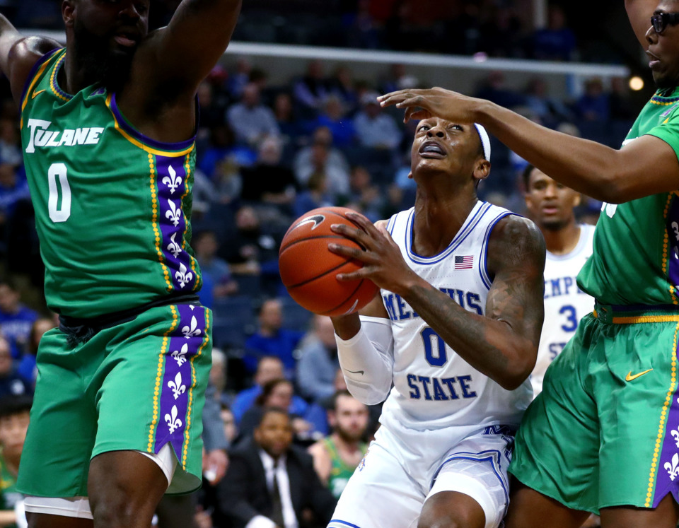 <strong>Memphis Tigers forward Kyvon Davenport (0) attempts a layup during a game against the Tulane Green Wave on Wednesday, Feb. 20, 2019, in Memphis.</strong> (Houston Cofield/Daily Memphian)