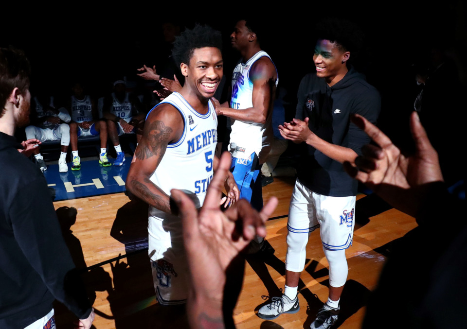 <strong>Memphis Tigers guard Kareem Brewton Jr. (5) laughs with some of his teammates as he's introduced on the court prior to a game against the Tulane Green Wave on Wednesday, Feb. 20, 2019, in Memphis.</strong> (Houston Cofield/Daily Memphian)