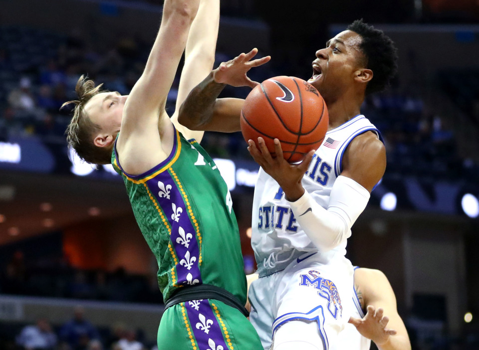 <strong>Memphis Tigers guard Tyler Harris (1) drives to the basket for a lay-up during a game against Tulane Green Wave on Wednesday, Feb. 20, 2019, in Memphis.&nbsp;</strong> (Houston Cofield/Daily Memphian)
