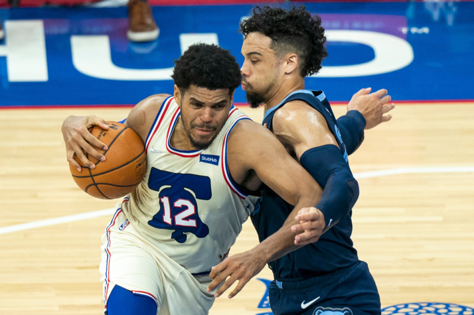 <strong>Philadelphia 76ers' Tobias Harris (left) makes his move against Memphis Grizzlies' Dillon Brooks during the first half of an NBA basketball game, Sunday, April 4, 2021, in Philadelphia.</strong> (AP Photo/Chris Szagola)