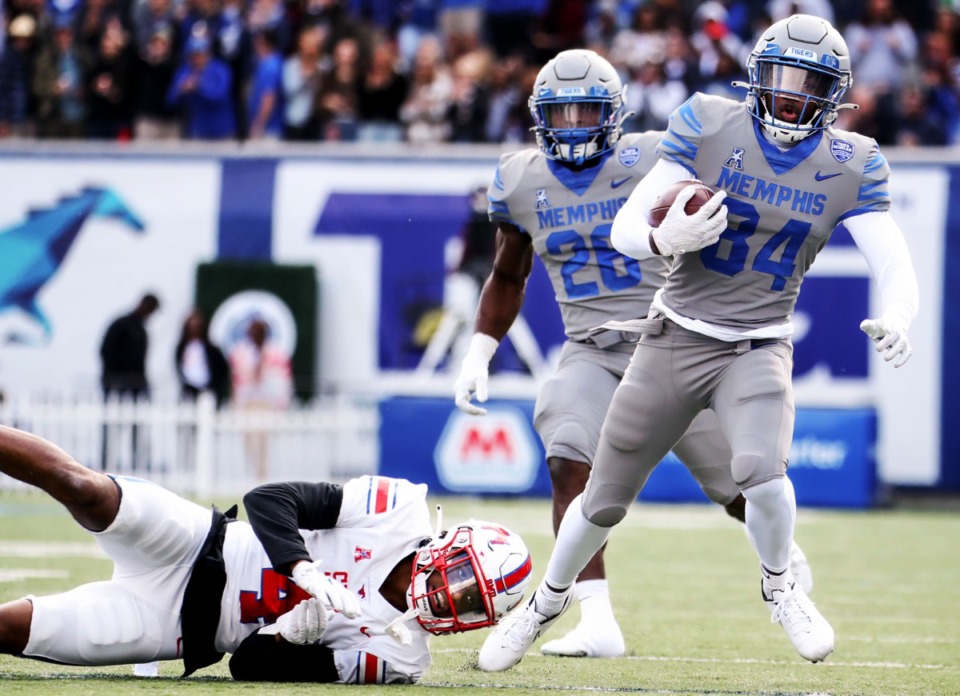 <strong>University of Memphis receiver Khi Mathieu (84) slips past an SMU defender during the Tigers&rsquo; home game on Saturday, Nov. 6.</strong> (Patrick Lantrip/Daily Memphian)
