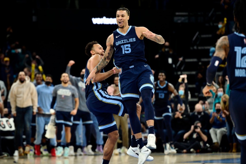 <strong>Grizzlies forwards Brandon Clarke (15) and Kyle Anderson, left, celebrate in overtime against Minnesota&nbsp;on Nov. 8 at FedExForum.</strong> (Brandon Dill/AP file)