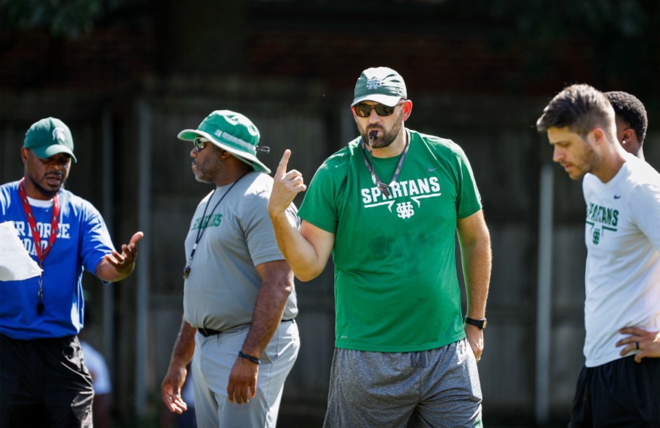 <strong>White Station head coach Reid Yarbrough (middle) seen during a walkthrough practice Monday, August 26, 2019.</strong> (Mark Weber/Daily Memphian)