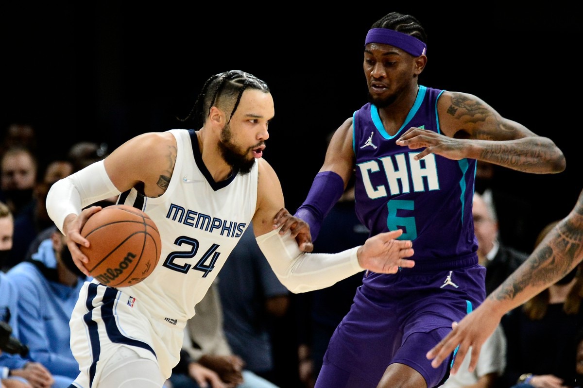 <strong>Grizzlies forward Dillon Brooks (24) handles the ball against Charlotte Hornets forward Jalen McDaniels (6) on Nov. 10 at FedExForum.</strong> (Brandon Dill/AP)