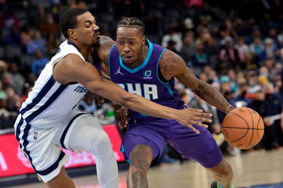 <strong>Charlotte Hornets guard Terry Rozier drives against Grizzlies guard De'Anthony Melton&nbsp;on Nov. 10 at FedExForum.</strong> (Brandon Dill/AP)
