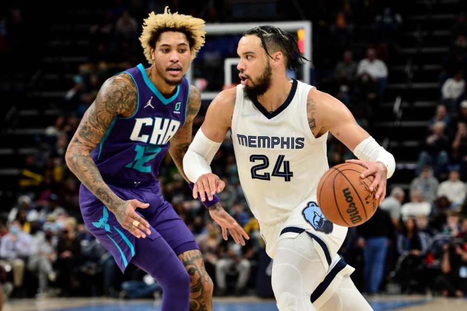 <strong>Memphis Grizzlies forward Dillon Brooks (24) drives against Charlotte Hornets guard Kelly Oubre Jr. (12) in the second half of an NBA basketball game Wednesday, Nov. 10, 2021, in Memphis, Tennessee.</strong> (AP Photo/Brandon Dill)