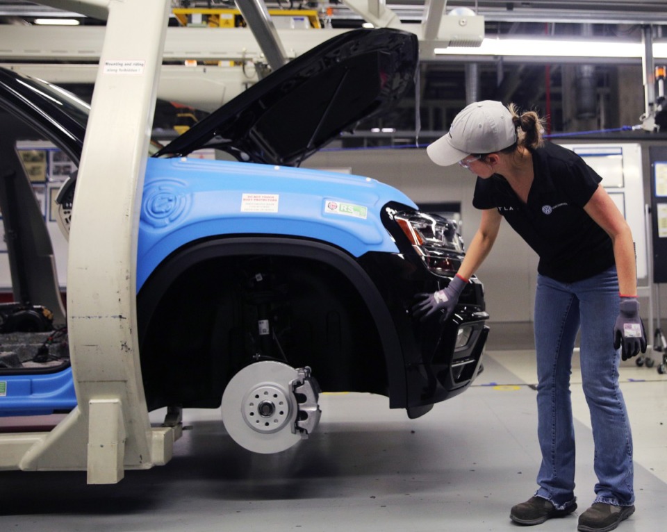 <strong>An employee inspects a vehicle at the Volkswagen Assembly Plant.&nbsp;The nickname Dynamo of Dixie goes back to when Chattanooga was a manufacturing and steel town.&nbsp;</strong>(Erin O. Smith/Chattanooga Times Free Press file)