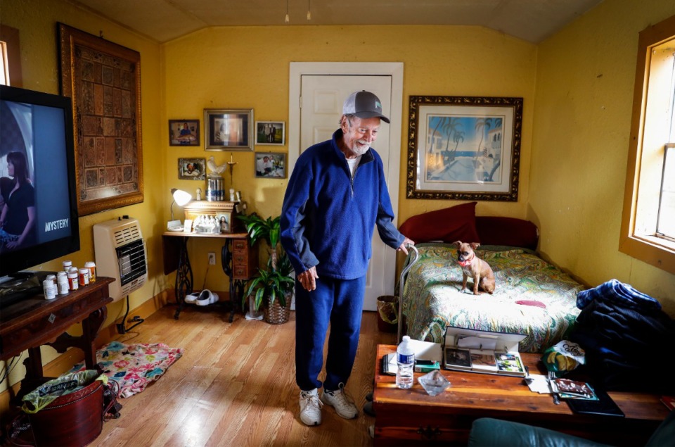 <strong>Herschel Gilbreath, 74, (with Venessa, his 6-month-old chihuahua mix) lived as an openly gay man in New Orleans. When he moved back to his hometown of Covington several years ago, he kept his gender orientation secret.</strong> (Mark Weber/Daily Memphian)