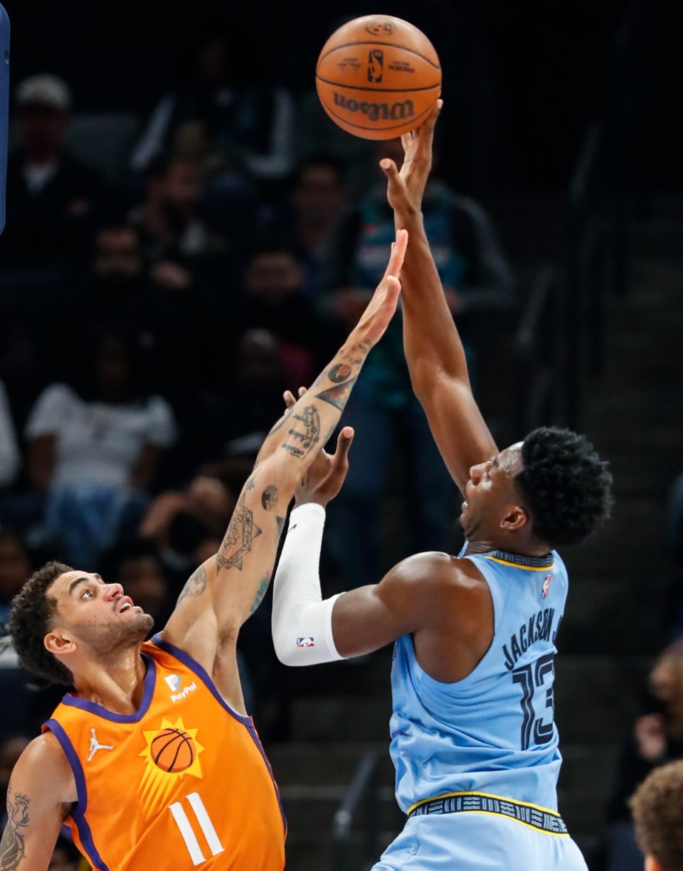 <strong>Memphis Grizzlies center Jaren Jackson Jr. puts up a shot over Phoenix Suns defender Abdel Nader during game action on Friday, Nov. 12.</strong> (Mark Weber/Daily Memphian)