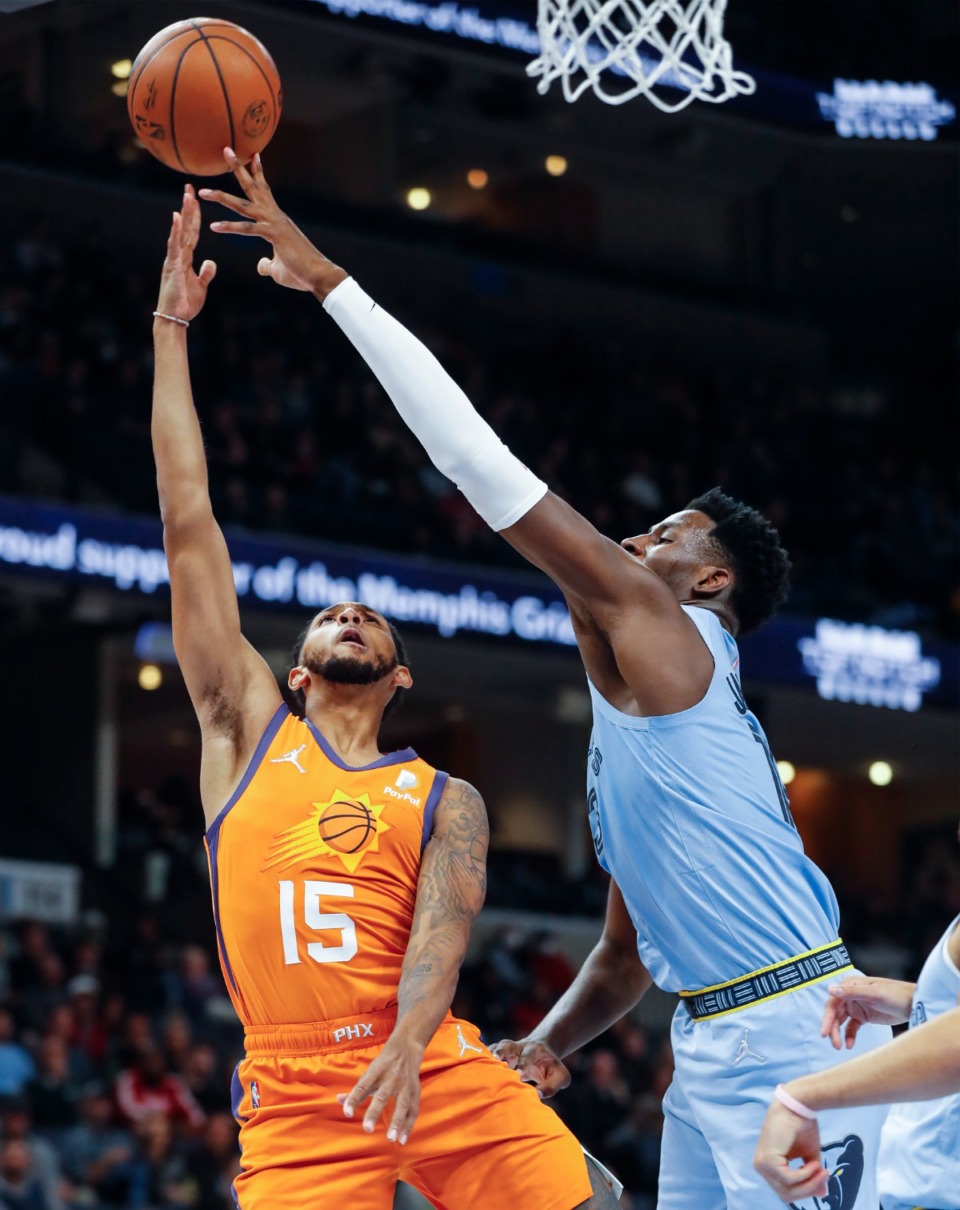 <strong>Memphis Grizzlies center Jaren Jackson Jr. blocks the shot of Phoenix Suns guard Cameron Payne (left) during game action on Friday, Nov. 12.</strong> (Mark Weber/Daily Memphian)
