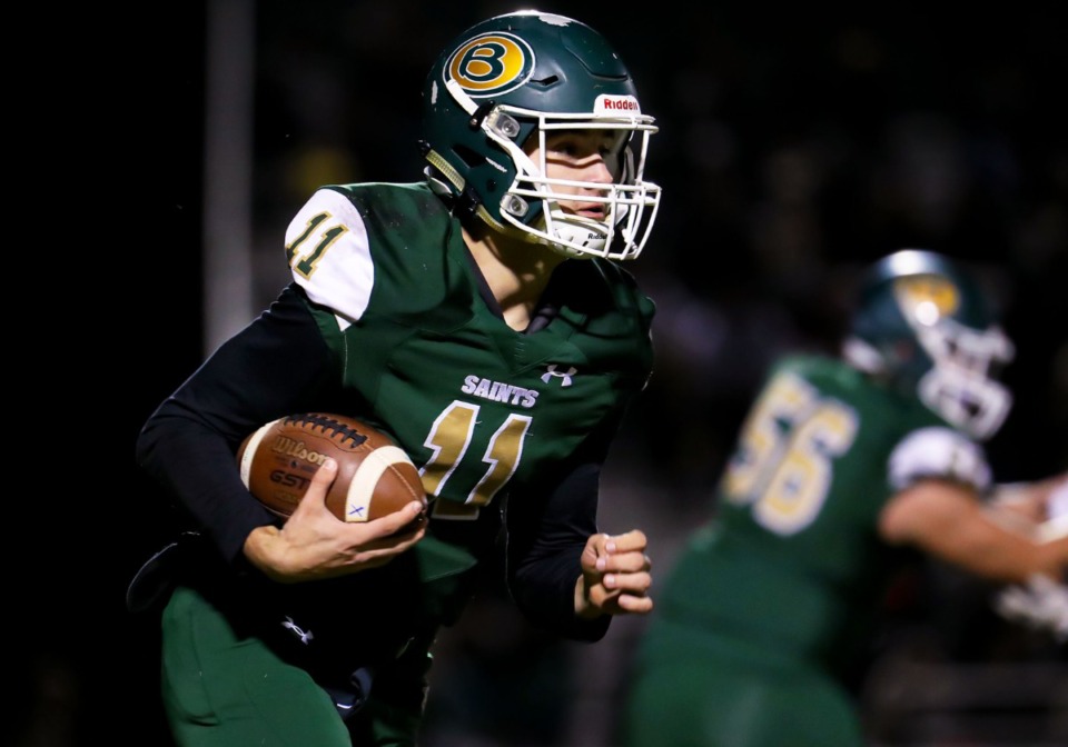 <strong>Briarcrest quarterback JD Sherrod (11) scrambles for a first down during the Nov. 12, 2021, game against CBHS.</strong> (Patrick Lantrip/Daily Memphian)