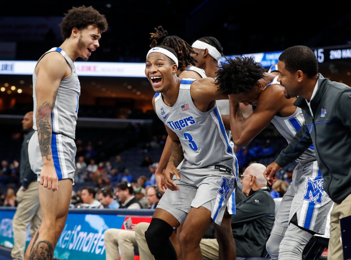 <strong>Landers Nolley II (middle) and his teammates celebrate on the bench during action against North Carolina Central on Saturday, Nov. 13, 2021.</strong> (Mark Weber/The Daily Memphian)