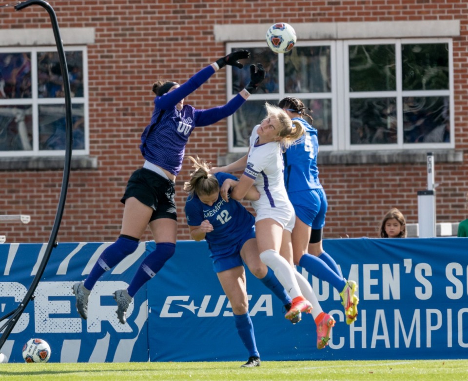<strong>University of Memphis goalie Elizabeth Moberg deflects the ball at the goal with assistance from Tanya Boychuk and Mackenzie Bray and with LSU's Savannah Mills trying to score in the first round of the NCAA soccer tournament at the Billy J. Murphy Track and Soccer Complex, Sunday, Nov. 14, 2021.</strong> (Greg Campbell/Special to The Daily Memphian)