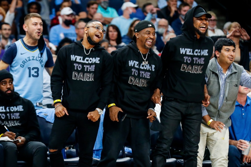 <strong>Memphis Grizzlies fans (left to right) Trey Draper, Marcus Williams and Tee Morant, father of guard Ja Morant, celebrate during action against Cleveland Cavaliers on Wednesday, Oct. 20, 2021.</strong> (Mark Weber/The Daily Memphian)