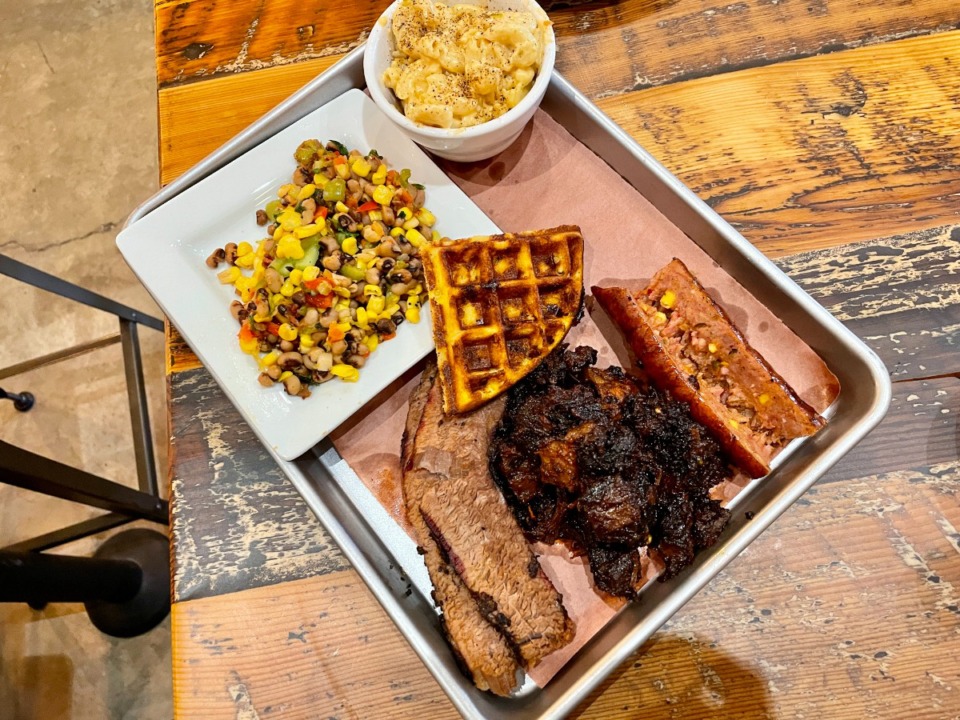 <strong>The three-meat sampler at Wolf River Brisket includes brisket, burnt ends and sausage.</strong> (Jennifer Biggs/ The Daily Memphian)