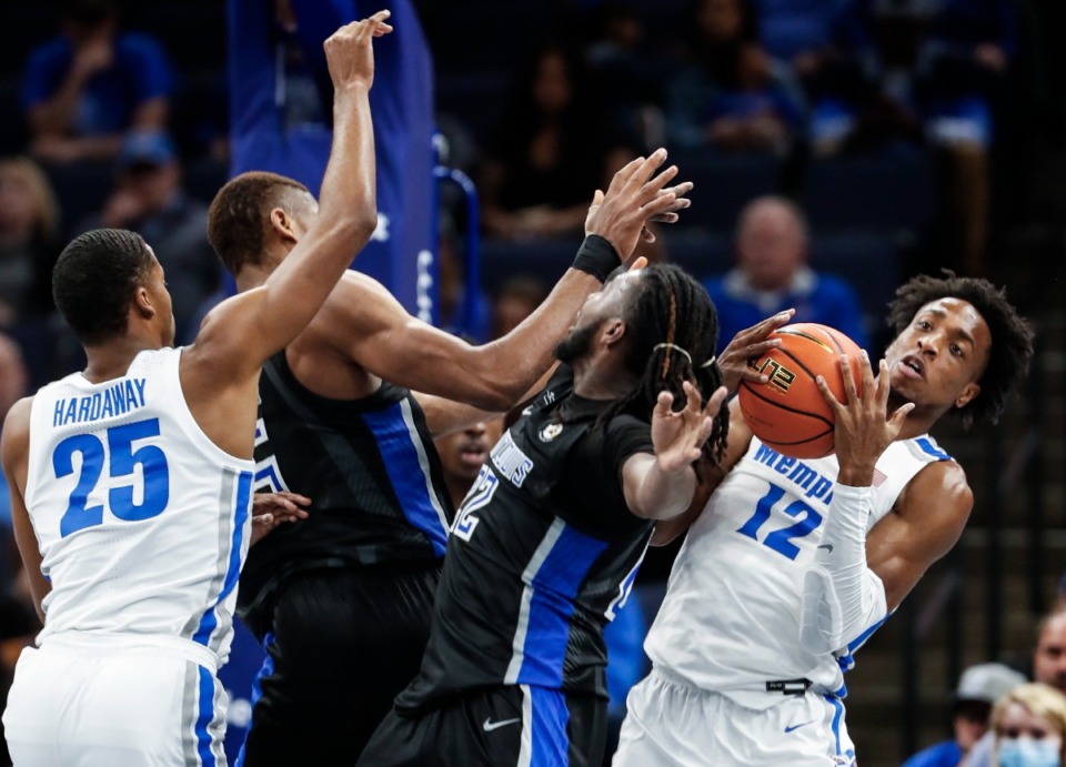 <strong>Tigers defender DeAndre Williams (right) grabs a rebound against Saint Louis on Tuesday, Nov. 16, 2021.</strong> (Mark Weber/The Daily Memphian)