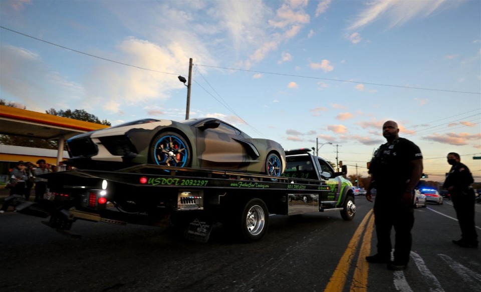 <strong>The car of Young Dolph gets towed down Airways Boulevard after the rapper was killed outside of a store&nbsp;on Airways Boulevard on Nov. 17, 2021.</strong>(Patrick Lantrip/Daily Memphian)
