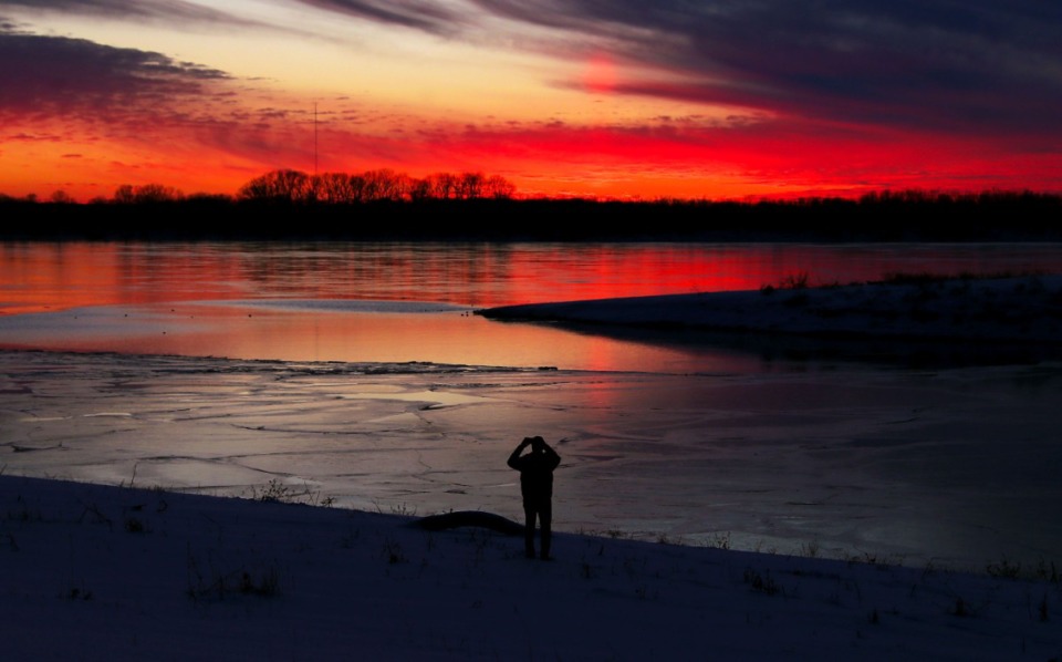 <strong>Before trains, airplaines or internet, the Mississippi River (where a passerby photographed ice at sunset Feb. 19, 2021) connected Memphis to ports around the world.</strong> (Patrick Lantrip/Daily Memphian)