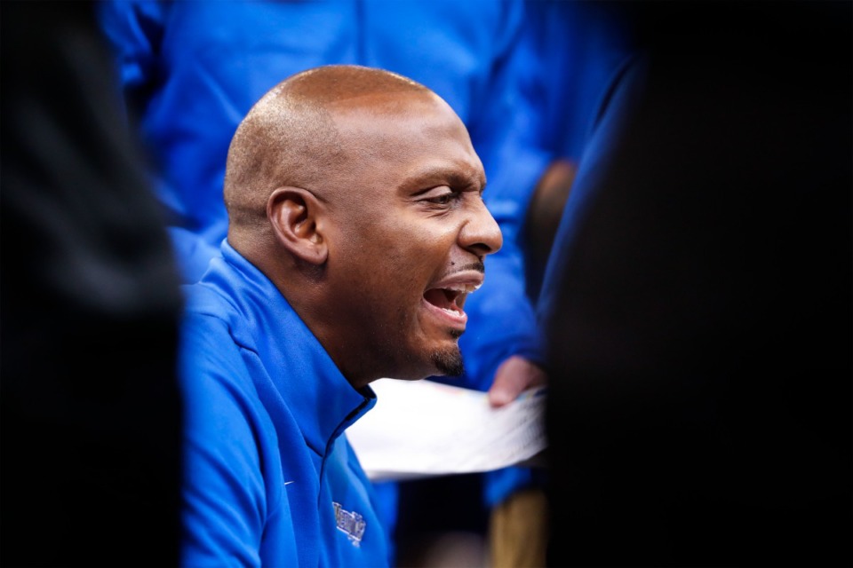 <strong>Tigers head coach Penny Hardaway gathers his players during a timeout against Western Kentucky University on Friday, Nov. 19, at FedExForum.</strong> (Mark Weber/Daily Memphian)
