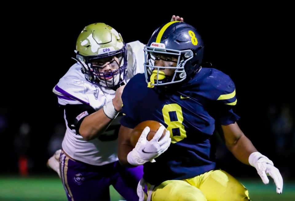 <strong>Lausanne running back Craig Cunningham (8) breaks a tackle during the Nov. 19, 2021, home game against CPA.</strong> (Patrick Lantrip/Daily Memphian)
