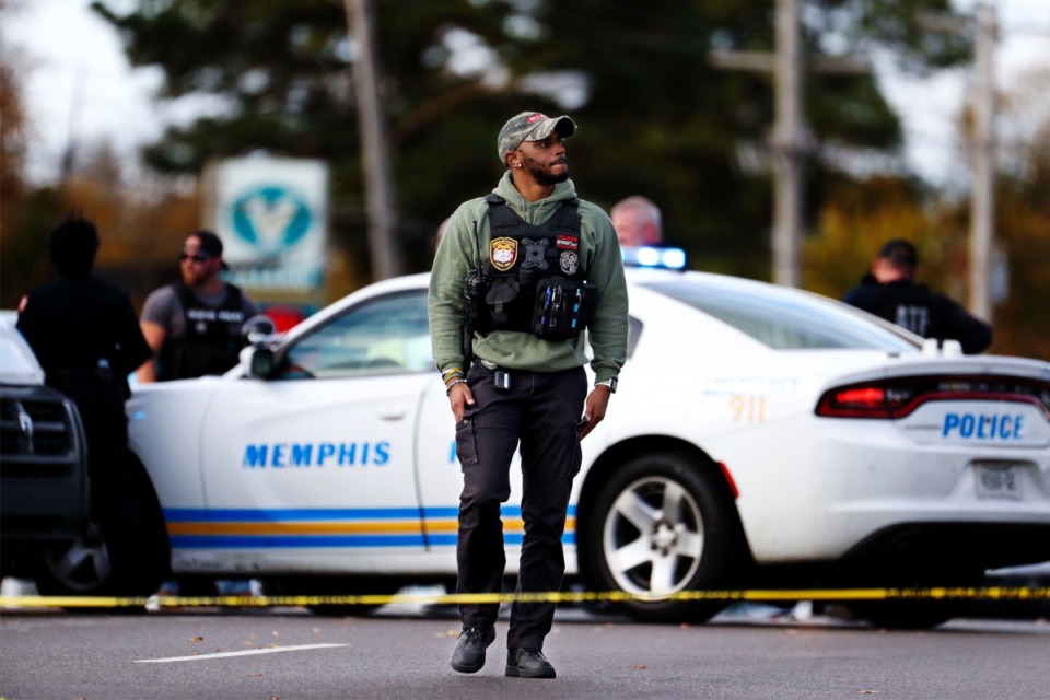 <strong>Memphis police officers work the scene where rapper Young Dolph was killed outside of a store in Memphis on Nov. 17, 2021.</strong> (Patrick Lantrip/Daily Memphian)