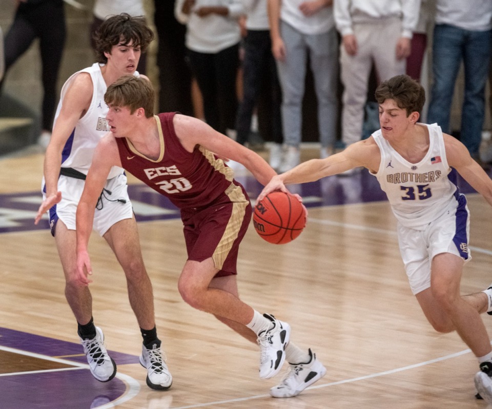 <strong>ECS's William Webster (20) has the ball stripped as he moves to the basket by CBHS's Michael Pepper (35) during the inaugural game at CBHS's new McNeil Family Fieldhouse, Tuesday, Nov. 23, 2021. ECS was defeated 57-25.</strong> (Greg Campbell/Special for The Daily Memphian)