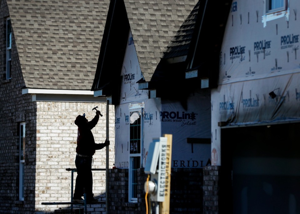 <strong>Brick masons work on Phase B house for Meridian Premier Homes on Friday, Nov. 19, 2021 in Walls, Mississippi.</strong> (Mark Weber/The Daily Memphian)